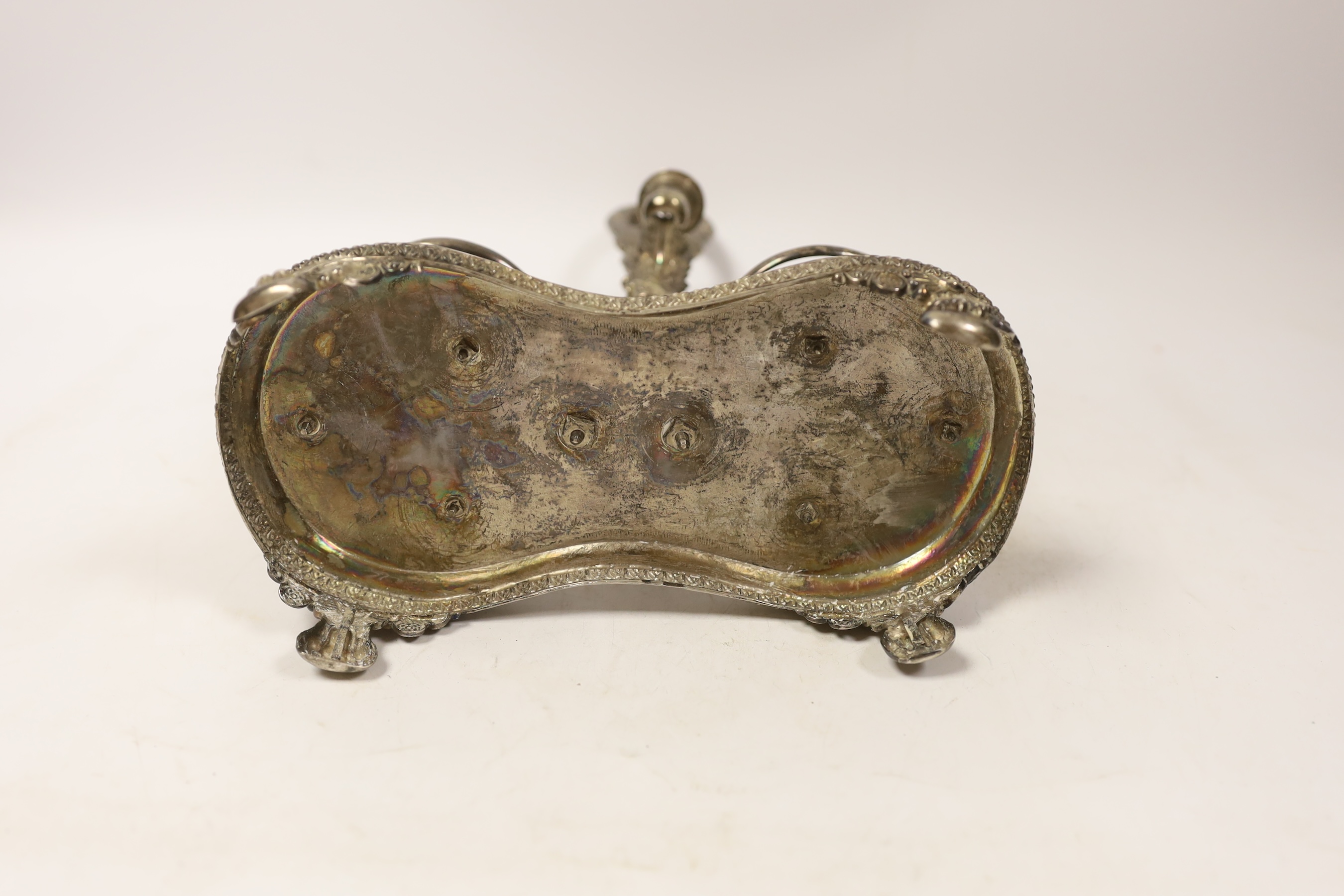 A 19th century Italian? white metal Empire style oil and vinegar stand, eight 31.5cm, 11.8oz. Condition - fair